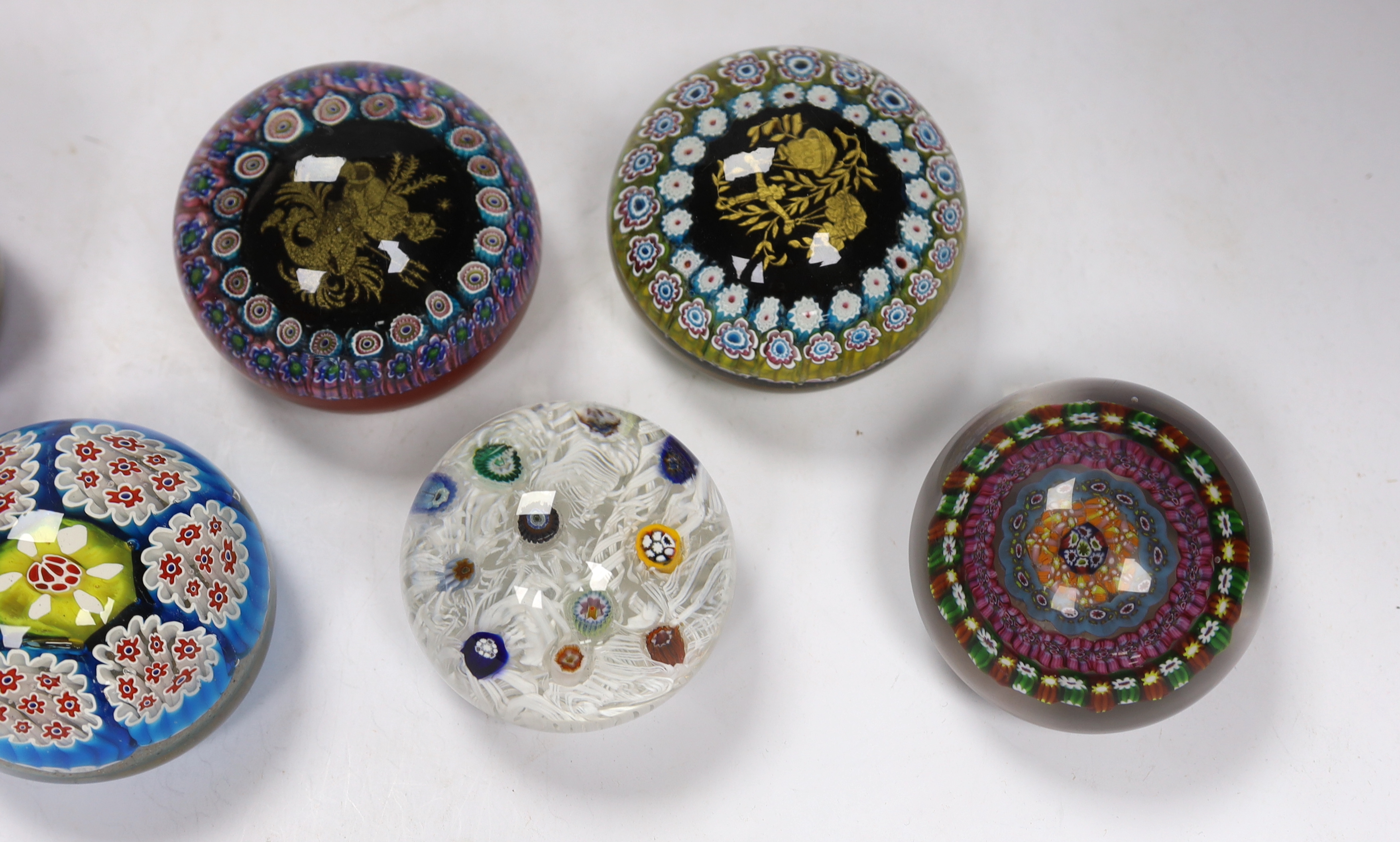 Seven various glass millefiori paperweights, Murano etc.